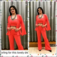 A wonderful client looking absolutely radiant in a custom-styled monochrome co-ord set. We chose this vibrant color and modern silhouette to match her bold personality, creating a look that is both stylish and comfortable.