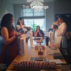 Learning and celebration are part of our studio culture. Here, our team gathers around a table filled with material samples and design books, sharing insights and celebrating milestones. These moments of collaboration and camaraderie fuel our creative journey.