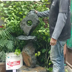 One of our artisans making a final adjustment to the 'Balance of Life' sculpture. This piece is a testament to our commitment to creating extraordinary, large-scale abstract art for discerning clients.