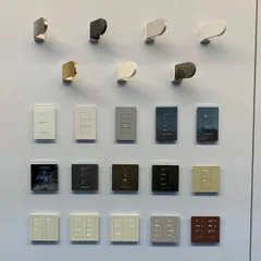 We offer an extensive selection of home automation switches and keypads to suit any decor. This display shows just a fraction of the styles, materials, and finishes available, from brushed metal to polished plastic, ensuring a perfect match for your interior design.