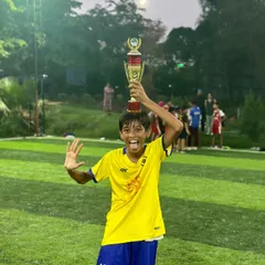 Pure excitement and joy. This player cannot contain his happiness after winning a trophy with his team.