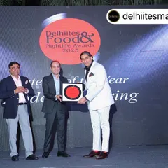 On stage receiving the 'Caterer of the Year' award at the Delhiites Food & Nightlife Awards 2023. It is an honor to be recognized year after year.