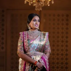 A regal portrait session for a client, featuring a stunning hand-embroidered blouse and a beautiful Kanjeevaram saree. The makeup was designed to give a royal, timeless feel.