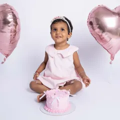 A sweet cake smash for a sweet two-year-old. These milestone sessions are filled with giggles, messy fingers, and pure joy, all captured against a clean, simple backdrop.