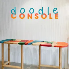 The "Doodle Console" is a functional piece of art, designed for a client who wanted something bright and colorful. Its interlocking, puzzle-like form and vibrant palette make it a standout piece of accent furniture that sparks joy.