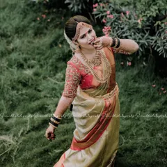 A playful, candid moment captured beautifully. The bride's makeup remains flawless even in natural outdoor lighting, highlighting the radiant and fresh look I aim for.