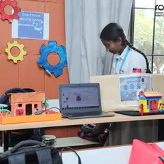 A young innovator presents her "Smart Home Security System" project at our RW2024 competition. Our programs empower students to build real-world applications that demonstrate their understanding of technology.