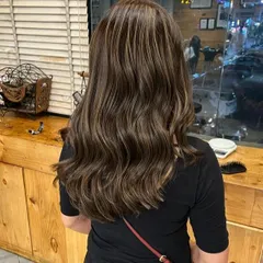 Another view of the blonde balayage, showing how the light reflects off the different tones, creating a beautiful, shimmering effect.
