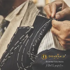 This is where the magic happens. A suit jacket in the making, with hand-basting stitches that ensure the structure and fit are perfect before the final sewing. This is true bespoke tailoring.