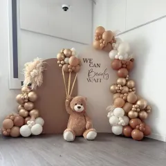 An adorable and stylish "We Can Bearly Wait" baby shower theme. The earthy, neutral tones and minimalist backdrops are perfect for a modern celebration.