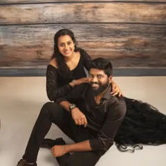 A lovely portrait of the new parents. This photo captures the couple's joy and connection after welcoming their newborn, taken during the same session as their full family portraits.