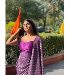 This look was for a fashion event where I wanted something that felt both glamorous and modern. I styled this pleated purple saree with a sweetheart neckline bustier, creating a look that’s part gown, part saree.