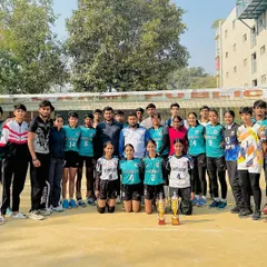 The whole family together. A large group photo of our boys and girls teams with their trophies, celebrating the success that comes from working together.