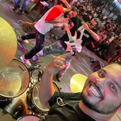 Happy Birthday to our beat machine, Jayaram. He's the heartbeat of MH43India, and we're grateful to have his rock-solid rhythm driving our sound. This drummer's-eye-view selfie with the crowd is legendary.