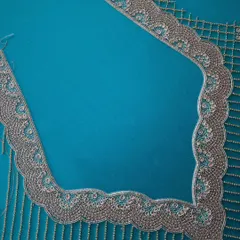 I believe in unleashing the artistry of my skilled artisans through intricate hand embroidery. This close-up reveals how we turn designer blouses into timeless expressions of elegance, elevating your style with every stitch.