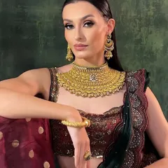 A powerful portrait from the campaign. The model's sharp features are enhanced with contouring and a defined eye, creating a striking and memorable image.