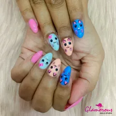 For the cat lovers, this adorable set features hand-painted cartoon cats in pastel shades of blue, pink, and peach. Each nail has a unique, playful expression.