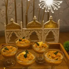 Luxury meets presentation in our flying buffet service. These beautifully arranged appetizers are served in sophisticated glasses, making them easy to hold and enjoy while mingling at a party.