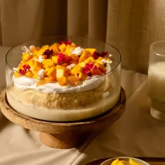 My Mango Tres Leches cake is a true labor of love. It's a light, airy sponge soaked in three kinds of milk and topped with fresh, sweet mangoes. It’s the perfect centerpiece for any special occasion.