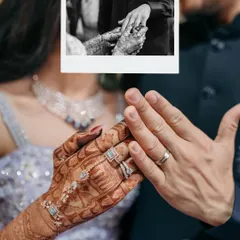 A focus on the hands, the rings, the promise. This creative shot layers a polaroid of the ring exchange over a close-up of their hands, symbolizing the moment their forever began.