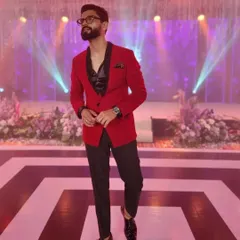 Bringing the fire in a sharp red and black suit. This look is perfect for a high-energy sangeet or a glamorous awards night.