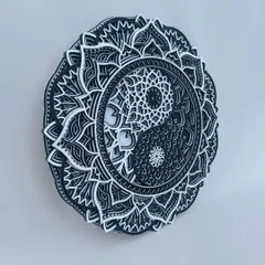 This perspective showcases the dimensionality of our wooden mandala art. The raised layers create shadows that shift throughout the day, making the art feel alive.