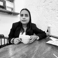 A black and white photo from the same cafe visit. It captures a more contemplative side to my personality, balancing the fierce advocate persona.
