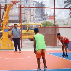 We provide access to modern, well-maintained basketball courts across the city. This court is set up for a junior league game, demonstrating a clean playing surface perfect for both competitive matches and casual games.