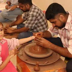 Learning together is the best kind of fun. Our parent-child workshops, like this pottery session, are designed for families to connect, create, and get their hands dirty while exploring the science of materials and motion.