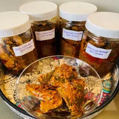 A closer look at my spicy Gila Aam Achar. You can see the chunks of raw mango coated in a thick, flavorful masala. I prepare this to have the perfect tangy and spicy balance that goes so well with Indian meals.