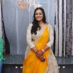 The client looking happy and radiant at her engagement party. The makeup is designed to look flawless in every photo.