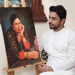 With the portrait I painted of my mother. Her blessings and her memory are the driving force behind my art and my life. This painting is my way of keeping her close to me always.