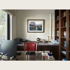This serene cityscape brings a sense of calm and perspective to a professional office, creating a sophisticated environment for focus and inspiration.
