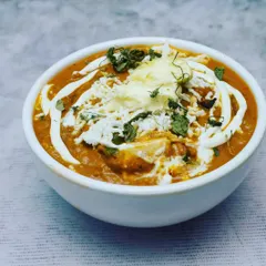 For those who like a bit more spice, my Kadhai Paneer is a great choice. It's cooked in a traditional kadhai with chunks of paneer, bell peppers, and a blend of aromatic spices.