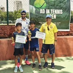 Great job by our young players at the Ad In Tennis Open. Pictured here are the winners and runners up, proudly showing their trophies and certificates with our coaches.