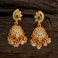 These gold-toned jhumkas are studded with clear stones and feature a crescent-shaped top with an emerald-colored accent. The bell is adorned with clusters of pearls, adding graceful movement.