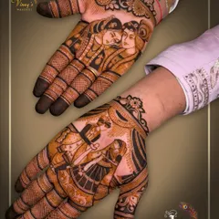 Mehndi is for grooms too! We create custom designs that complement the bride's art, like these featuring a Radha Krishna portrait on one hand and a dynamic varmala scene on the other, celebrating your union in style.