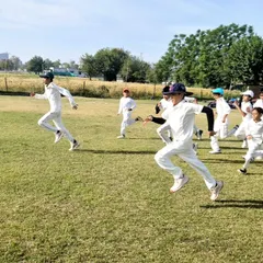 The energy and effort during a warm up run. We ensure our players are physically prepared for every session, building their stamina and getting their bodies ready for intense drills.
