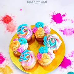 Celebrate Holi with a burst of color and flavor. These special edition cupcakes are decorated with vibrant, multi-colored frosting to match the festive spirit of Holi.