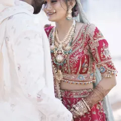 An intimate moment between the bride and groom. My goal is to create makeup that feels so light and natural that you can forget it's there and just be present in these beautiful moments.