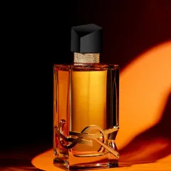 How do you photograph a scent? For this YSL Libre bottle, I used a play of hard light and deep shadow against a bold orange backdrop. The goal was to create an image as seductive and warm as the fragrance itself, focusing on the bottle's sculptural lines and the golden liquid within.