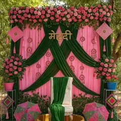 For a vibrant Mehandi function, I created this beautiful outdoor setup. It features a bright pink and green drape backdrop, the bride's name in Hindi, traditional Rajasthani umbrellas, and dreamcatchers for a fun, folk-inspired look.