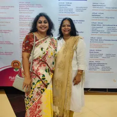 Posing with another amazing storyteller in front of the event schedule at a festival. Every performance I watch is a learning experience, a chance to soak it all in and learn from the best in the field.