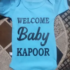 Welcome the new arrival with a personalized "Welcome Baby Kapoor" onesie. I can print any name or message on these soft cotton rompers.