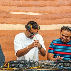 Sharing a laugh with a friend while playing a Sunday brunch set at Lumara. B2B sets are always fun, bouncing ideas and energy off each other.