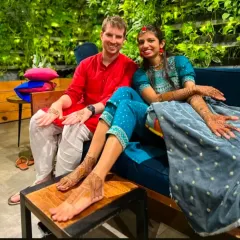 It's wonderful to be a part of multicultural weddings. Here, a happy couple displays their complementary mehandi and foot henna.