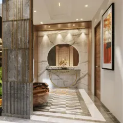 The hallway leading from the atrium features a stunning marble-clad wall with a circular mirror and console table, creating an elegant focal point.