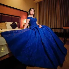 Something in blue. This royal blue ball gown is perfect for a grand reception or engagement party. I kept the makeup classic and elegant.