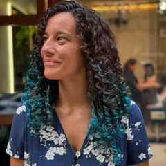 A beautiful profile of the client enjoying her new pop of color.