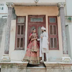 A royal portrait of the couple in the heritage lanes of Patan. Using unique, historic locations for your wedding adds a layer of timeless charm and character.